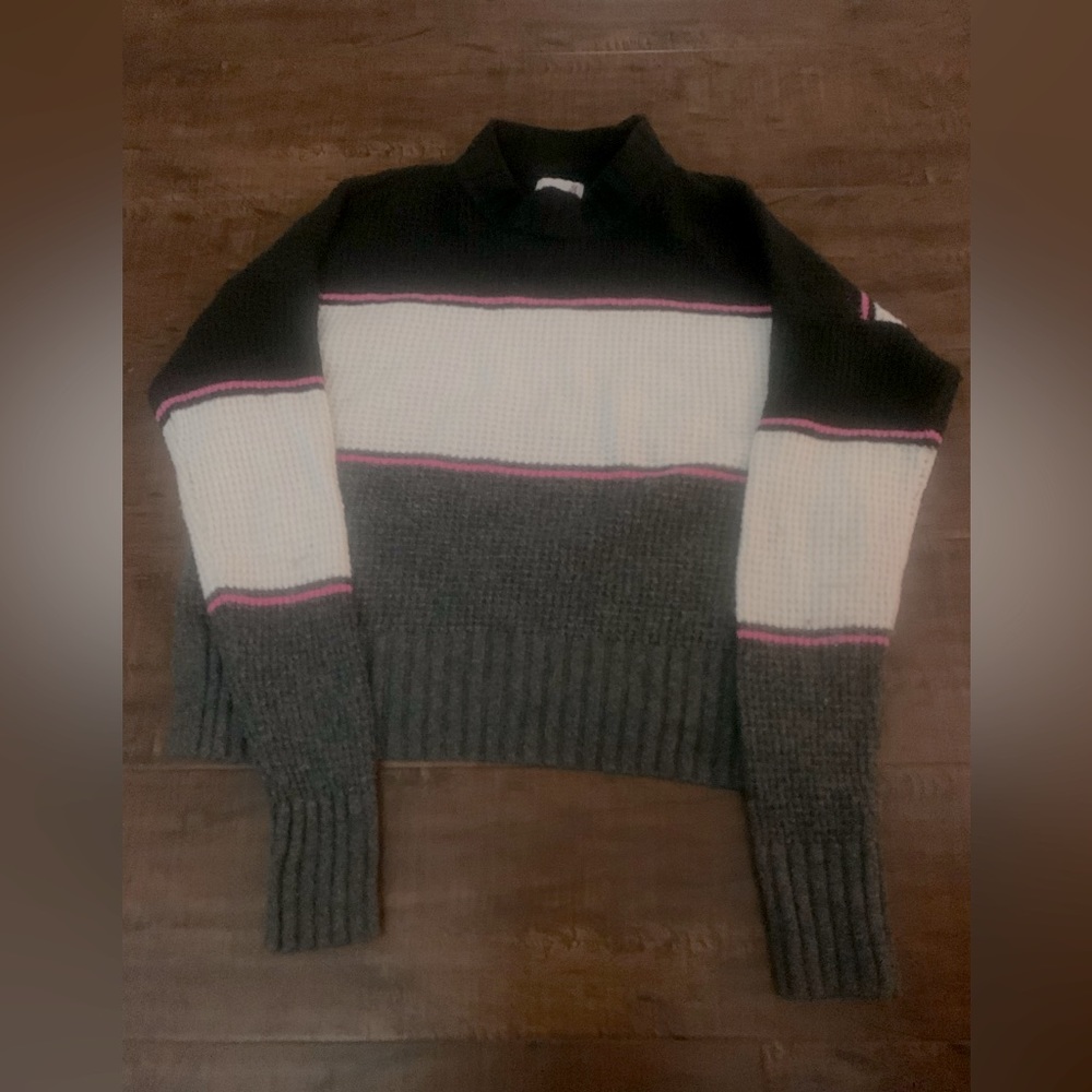 So brand turtleneck sweater with black, white and pink stripes